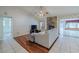 Living room with hardwood floors and a cozy seating area at 4228 Spring Way Cir, Valrico, FL 33596