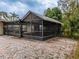 Spacious screened patio area adjacent to the house at 4228 Spring Way Cir, Valrico, FL 33596