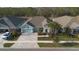 Stunning aerial view of a single Gathering home at 4449 Tour Trce, Land O Lakes, FL 34638