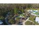 Community playground with playset and fire pit at 4449 Tour Trce, Land O Lakes, FL 34638