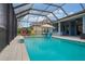 Relaxing screened pool with plenty of space for lounging at 4449 Tour Trce, Land O Lakes, FL 34638