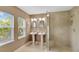 Elegant bathroom with double vanity and walk-in shower at 4845 W Sunset Blvd, Tampa, FL 33629