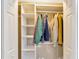 White built-in closet with shelves and hanging rods at 4845 W Sunset Blvd, Tampa, FL 33629