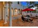 Outdoor patio with seating area, fountain, and arched entryway at 4845 W Sunset Blvd, Tampa, FL 33629