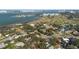 Wide aerial view of the neighborhood, highlighting waterfront and golf course proximity at 530 Ponce De Leon Blvd, Belleair, FL 33756