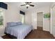 Cozy bedroom with window seating, carpet, and a large closet at 530 Ponce De Leon Blvd, Belleair, FL 33756