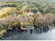 Aerial view showcasing a home's waterfront location and private dock at 5649 Glencrest Blvd, Tampa, FL 33625