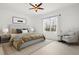 Main bedroom with light walls and neutral decor at 5649 Glencrest Blvd, Tampa, FL 33625