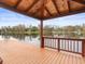 Covered gazebo on a spacious lakefront dock, ideal for outdoor relaxation at 5649 Glencrest Blvd, Tampa, FL 33625