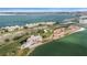 Aerial view of luxurious waterfront condo with golf course views at 5700 Escondida S Blvd # 302, St Petersburg, FL 33715