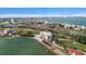 Aerial view of waterfront property, showcasing the building and surroundings at 5700 Escondida S Blvd # 302, St Petersburg, FL 33715