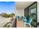 Relaxing balcony with patio furniture and water views at 5700 Escondida S Blvd # 302, St Petersburg, FL 33715