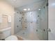 Large walk-in shower with tiled walls and glass enclosure at 5700 Escondida S Blvd # 302, St Petersburg, FL 33715