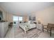 Main bedroom with water views and king-size bed at 5700 Escondida S Blvd # 302, St Petersburg, FL 33715