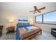 Bedroom with king bed and water views at 5700 Escondida S Blvd # 302, St Petersburg, FL 33715