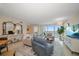 Living room boasts water views and stylish furnishings at 5700 Escondida S Blvd # 302, St Petersburg, FL 33715