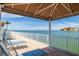 Relaxing waterfront deck with covered seating at 6020 Shore S Blvd # 411, Gulfport, FL 33707