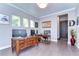 Home office with hardwood floors, two desks and ample natural light at 6120 Watercolor Dr, Lithia, FL 33547