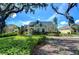 Charming house exterior with landscaping and walkway at 6120 Watercolor Dr, Lithia, FL 33547