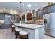 Gourmet kitchen with large island and granite countertops at 6120 Watercolor Dr, Lithia, FL 33547