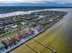 Aerial view of waterfront homes with private docks and pools at 6408 Bright Bay Ct, Apollo Beach, FL 33572