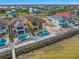 Aerial view of waterfront home with private pool and spa at 6408 Bright Bay Ct, Apollo Beach, FL 33572