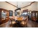 Formal dining room with an oval table and hardwood floors at 6408 Bright Bay Ct, Apollo Beach, FL 33572