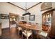 Bright dining room, hardwood floors, view into living room at 6408 Bright Bay Ct, Apollo Beach, FL 33572