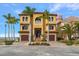 Luxury waterfront home with fountain and palm trees at 6408 Bright Bay Ct, Apollo Beach, FL 33572