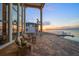 Spacious waterfront patio with wicker seating at 6408 Bright Bay Ct, Apollo Beach, FL 33572