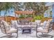 Relaxing patio with fire pit and seating area at 674 61St S Ave, St Petersburg, FL 33705