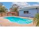 Refreshing kidney-shaped pool in a fenced backyard at 674 61St S Ave, St Petersburg, FL 33705