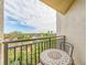 Enjoy the view from this balcony with table and chairs at 690 Island Way # 410, Clearwater Beach, FL 33767