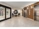 Modern lobby with elevators and seating area at 690 Island Way # 410, Clearwater Beach, FL 33767