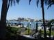 Outdoor patio with grill and waterfront views at 690 Island Way # 410, Clearwater Beach, FL 33767