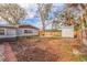 Large backyard with firepit and storage shed at 7000 Dr Martin Luther King Jr S St, St Petersburg, FL 33705