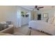 Bright bedroom with ceiling fan and sitting area, offering a tranquil atmosphere at 7000 Dr Martin Luther King Jr S St, St Petersburg, FL 33705