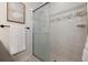 Clean and bright shower with marble tile at 7000 Dr Martin Luther King Jr S St, St Petersburg, FL 33705