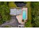 Community pool and surrounding landscape from overhead at 7117 E Bank Dr # 2, Tampa, FL 33617