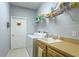 Laundry room with washer, dryer, and utility sink at 7304 Cleopatra Dr, Land O Lakes, FL 34637