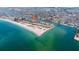 Aerial view showcasing beachfront location of condo building at 7537 Bayshore Dr # 406, Treasure Island, FL 33706