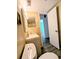 Clean bathroom with a vanity, toilet and access to another bedroom at 8702 Mallard Reserve Dr # 104, Tampa, FL 33614