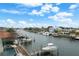 Stunning aerial view of waterfront homes and boats at 1077 Pinellas Bayway S, Tierra Verde, FL 33715