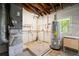 Unfinished basement with laundry hookups and water heater at 1085 Indian Rocks S Rd, Largo, FL 33770