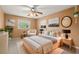 Bedroom with king bed, light walls, and modern decor at 1085 Indian Rocks S Rd, Largo, FL 33770