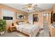 Bedroom with king bed, light walls, and modern decor at 1085 Indian Rocks S Rd, Largo, FL 33770