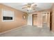 Empty bedroom with ceiling fan and window with blinds at 1085 Indian Rocks S Rd, Largo, FL 33770