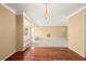 Dining room with hardwood floors and an open concept design at 1085 Indian Rocks S Rd, Largo, FL 33770