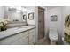 Updated bathroom with a vanity, shower, and toilet at 12300 Vonn Rd # 6101, Largo, FL 33774