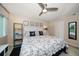 Main bedroom with king-size bed and stylish decor at 12300 Vonn Rd # 6101, Largo, FL 33774